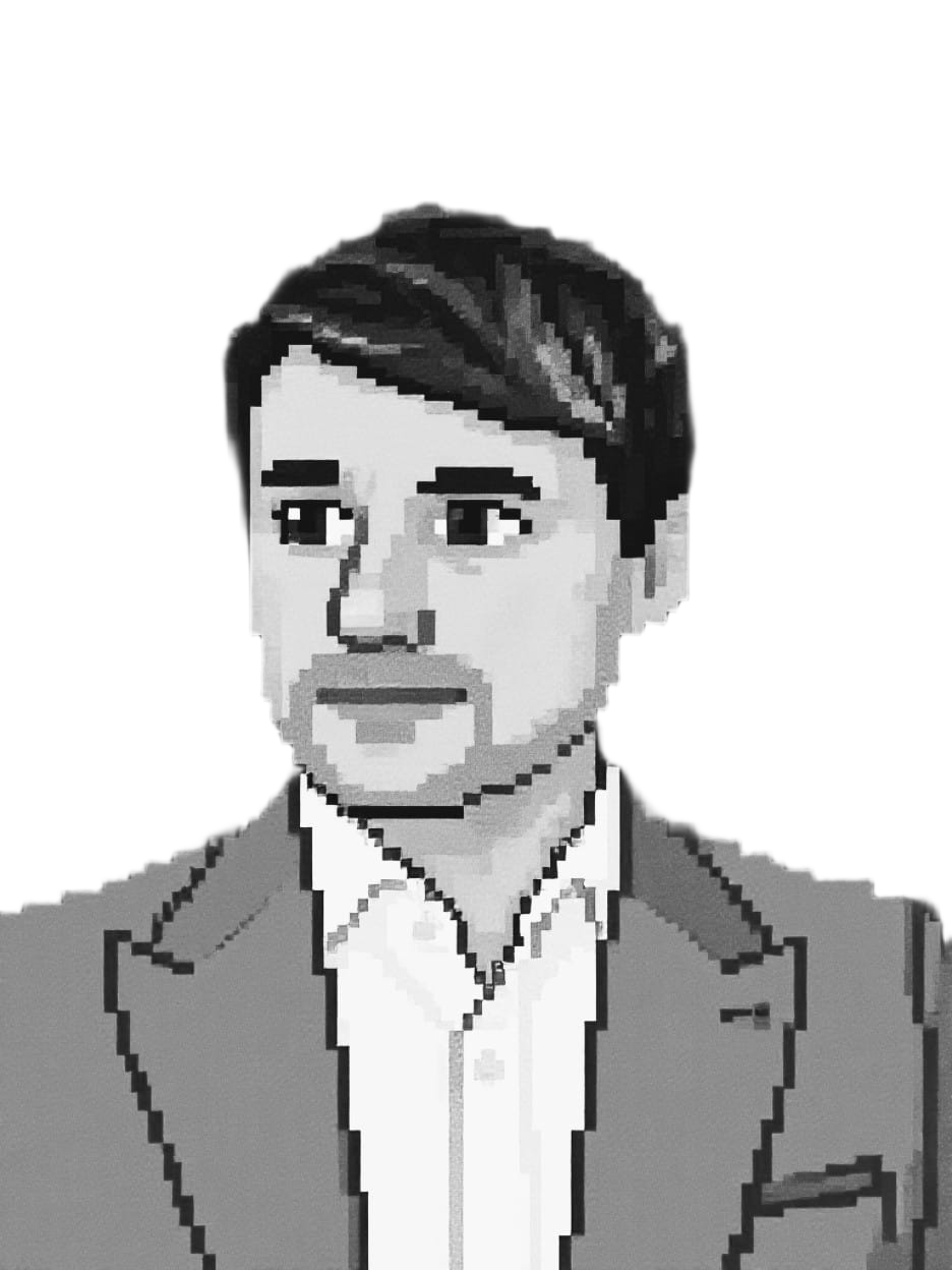 A man wearing a grey suit and white shirt looking over to the left.